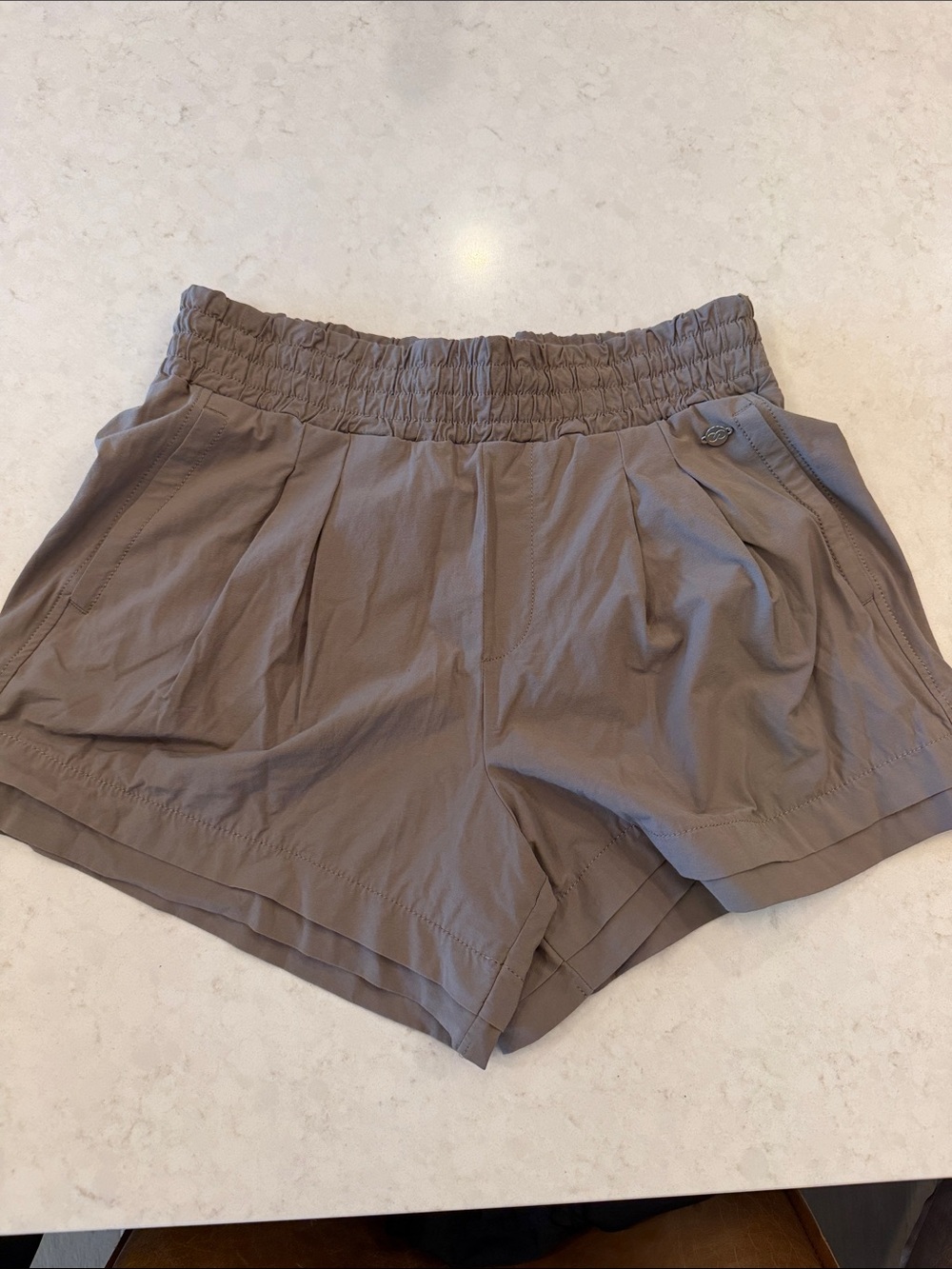 CALIA by Carrie Underwood High-Waist Pleated Shorts in Taupe